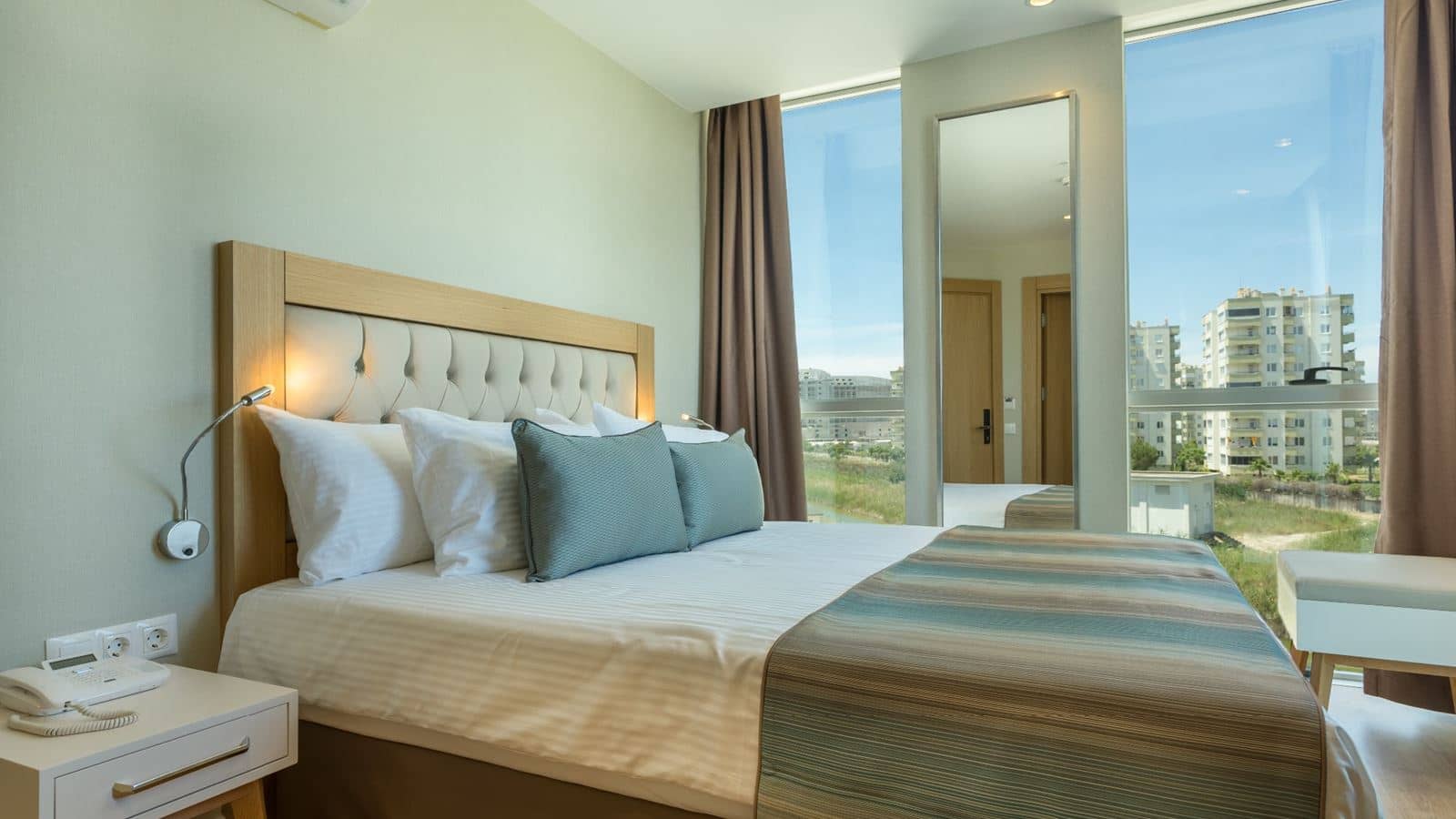 rooms-aska-river-side-anex-building-standart-land-view-room--french-balcony