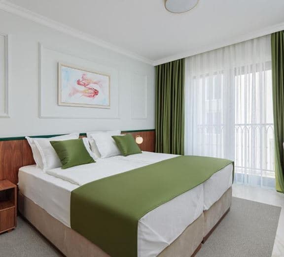 STANDARD DOUBLE ROOM WITH EXTRABED Kambariai