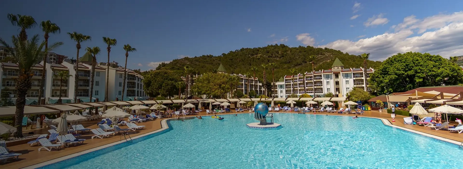 <div style="padding-left: 70px;"><img style="width: 100px; height: auto; margin: 25px 0;" src="https://b2ccdn.coraltravel.lt/content/Main Page Hotels Banners Destinations_Turkyie LT.svg" loading="lazy"></div>
<div style="padding-left: 70px; margin-bottom: 20px;"><img style="width: 200px; height: auto;" src="https://b2ccdn.coraltravel.lt/content/logos/hotel-logos/marvida pacha w200px.webp" loading="lazy"></div>
<div style="padding-left: 70px; font-size: 28px; font-weight: 600;">MARVIDA CLUB PALMERAS PASCHA</div>