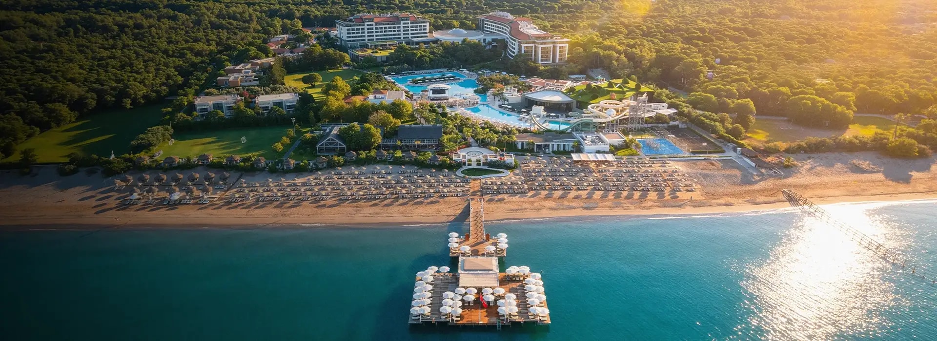 <div style="padding-left: 70px;"><img style="width: 100px; height: auto; margin: 25px 0;" src="https://b2ccdn.coraltravel.lt/content/Main Page Hotels Banners Destinations_Turkyie LT.svg" loading="lazy"></div>
<div style="padding-left: 70px; margin-bottom: 20px;"><img style="width: 200px; height: auto;" src="https://b2ccdn.coraltravel.lt/content/logos/hotel-logos/elaexcellence-w200px.webp" loading="lazy"></div>
<div style="font-size: 28px; font-weight: 600; padding-left: 70px;">Ela Excellence</div>